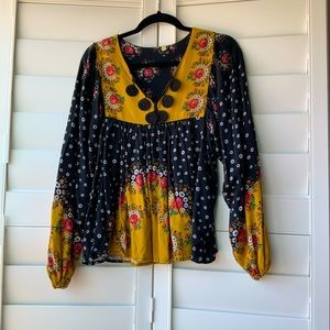 Black and yellow floral long-sleeved blouse